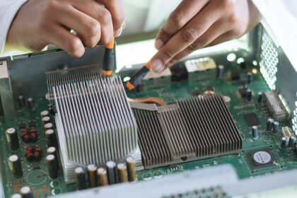 pic man repairing semiconductors 637435354060707899 Large, GPTTradeAssist.com